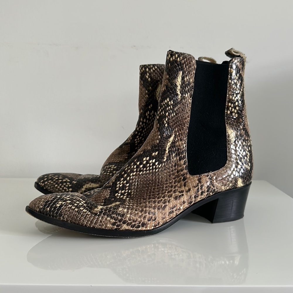 Snakeskin booties.